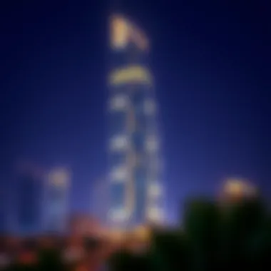 Night view of Al Moosa Tower 2 illuminated against the city lights
